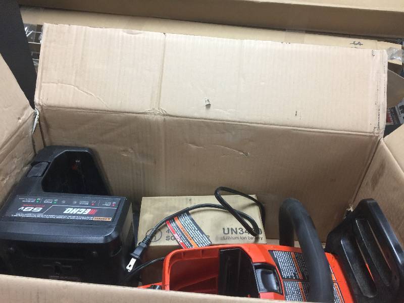 lot 56 image: ECHO 16 in. 58-Volt Lithium-Ion Brushless Cordless Chainsaw Model#  CCS-58V4AH  used in working conditions