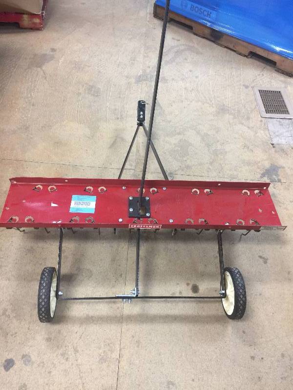 lot 80 image: Craftsman 40 in. Rear Mount Dethatcher