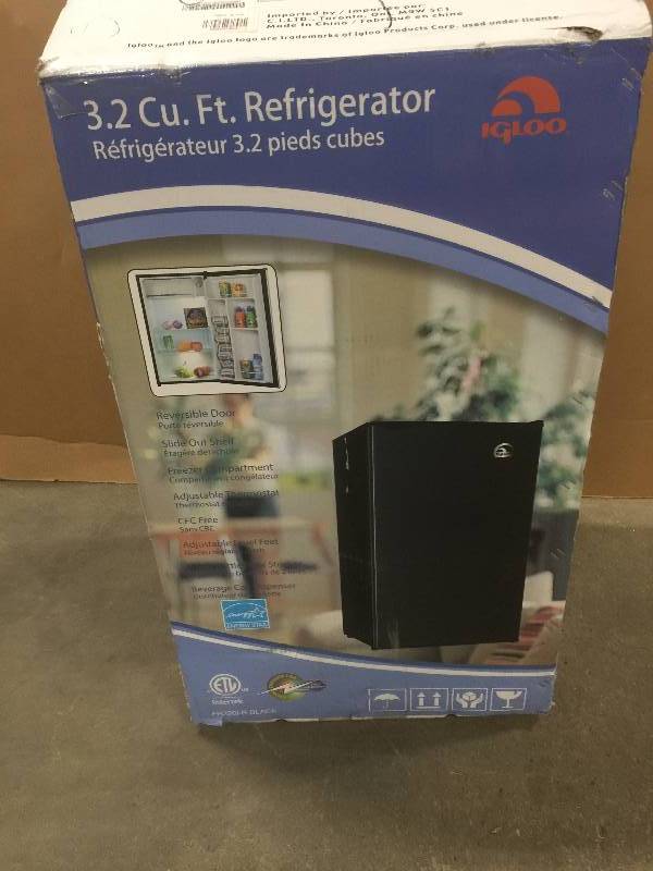 lot 1 image: IGLOO 3.2 cu. ft. Mini Refrigerator in Black Model#  FR320-BLACK  open box never used