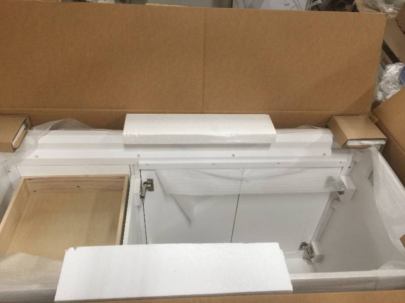 lot 16 image: Foremost Naples 48 in. W x 21-58 in. D x 34 in. H Vanity Cabinet Only in White open box never used