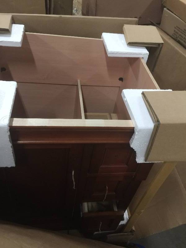 lot 19 image: Foremost Naples 24 in. W x 21-78 in. D x 34 in. H Vanity Cabinet Only in Warm Cinnamon open box never used
