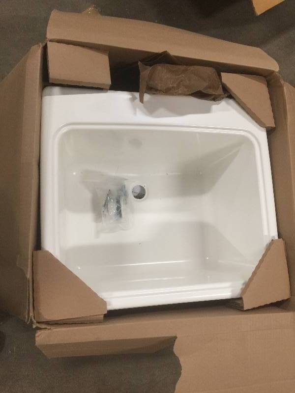 lot 64 image: Swan 25 in. x 22 in. x 13-916 in. Solid Surface Utility Sink not used