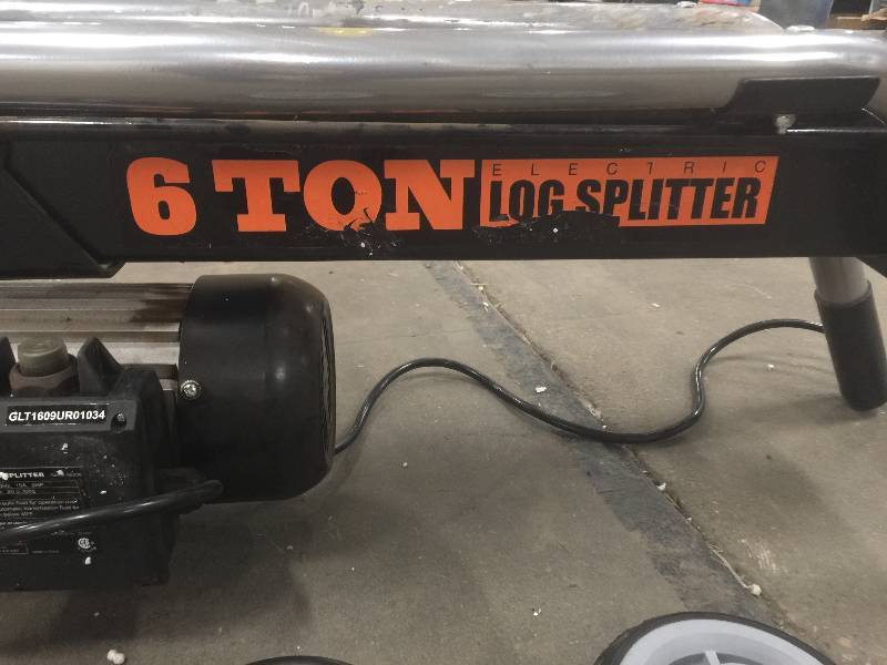 lot 38 image: WEN 6-Ton 15 Amp Electric Log Splitter used in working conditions
