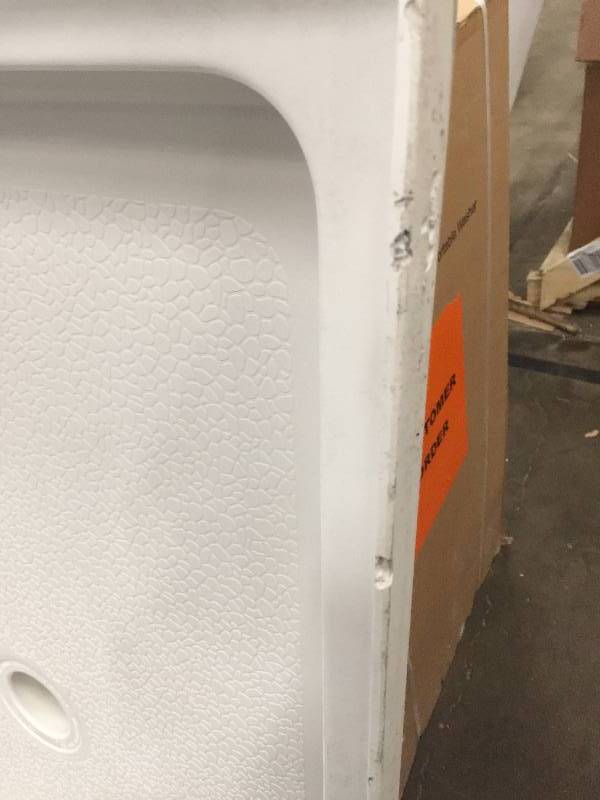 lot 104 image: Swan 32 in. x 48 in. Fiberglass Single Threshold Shower Floor in White small damage not used