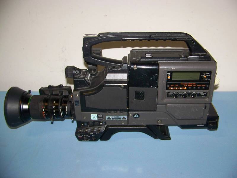 lot 75 image: JVC, Color Video Camera with Video Recorder, Viewfinder, Tripod Plate and more in Shok-Stop, Heavy-Duty Travel Case on Wheels