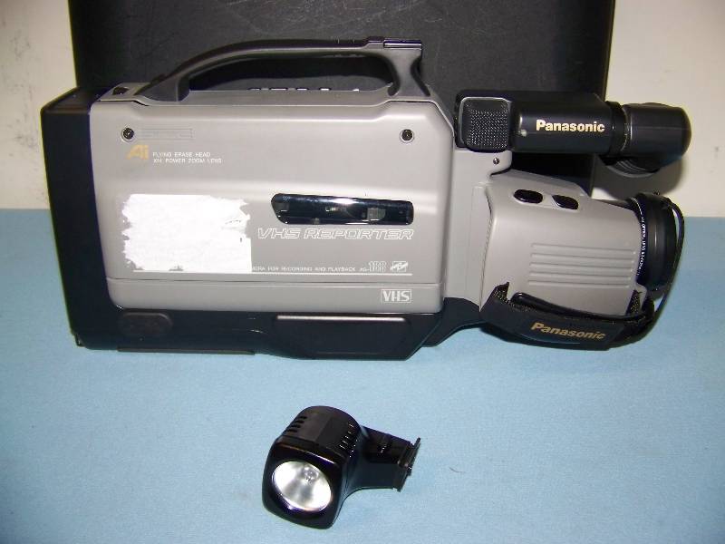 lot 77 image: Panasonic, VHS Reporter, VHS Movie Camera for Recording and Playback with AC Adapter in Hard-Sided Case