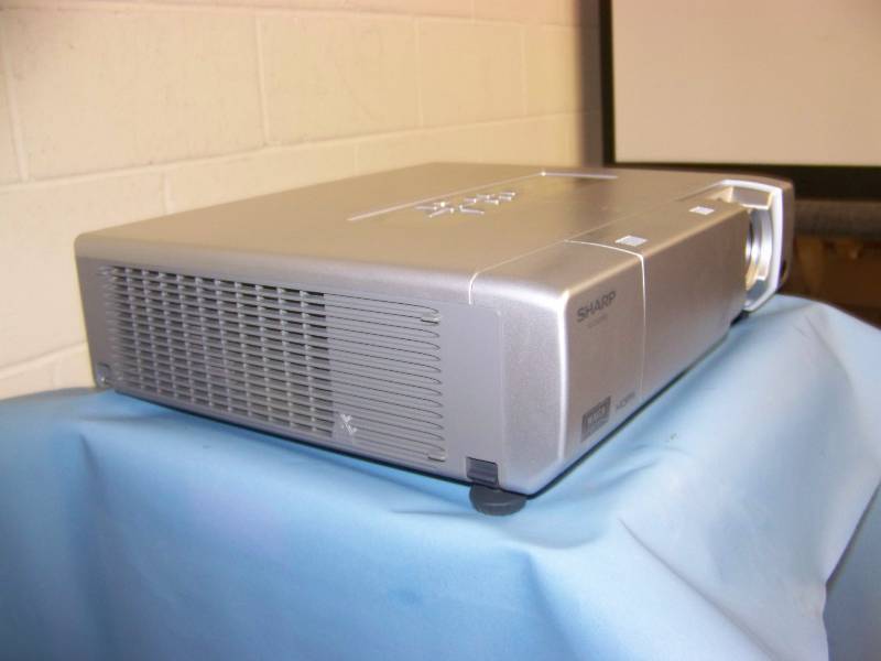 lot 4 image: Sharp, PG-D40W3D, DLP Projector with HDMI Input