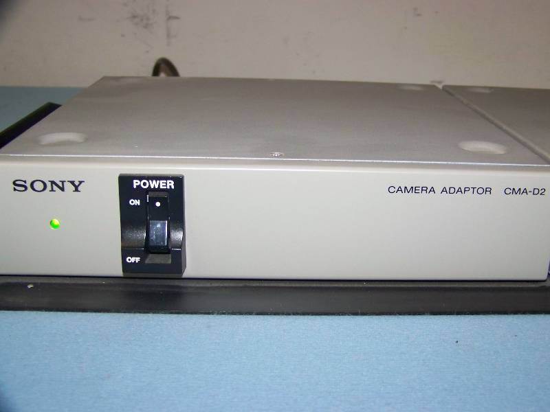 lot 78 image: (2) Sony, Camera Adapters mounted on Rack Shelf