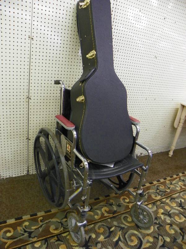 GUITAR CASE AND WHEEL CHAIR