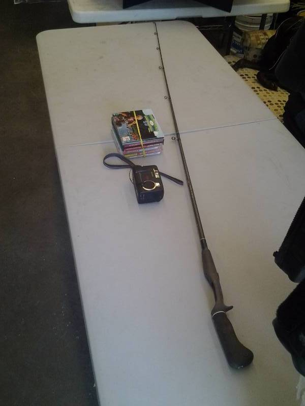 lot 14 image: Fenwick Graphite Medium Action Casting Rod, Assorted Computer Games, Toshiba Digital Camera