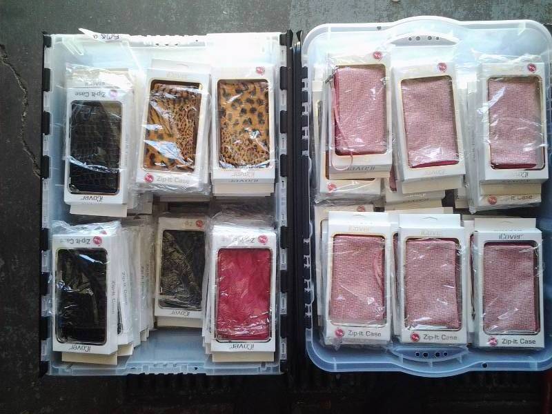 lot 29 image: Approx. 130 I Cover Zip-It Cases (Assorted Colors & Patterns) & Generic Small Zippered Pouches