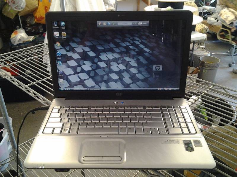 lot 36 image: HP- G60 Lap Top With Charger Works