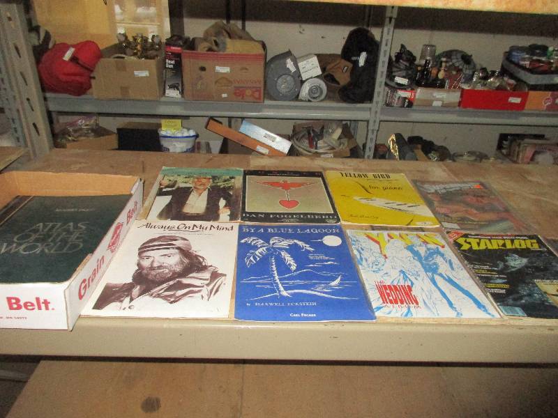lot 22 image: world atlas - 4 comics - piano sheet music