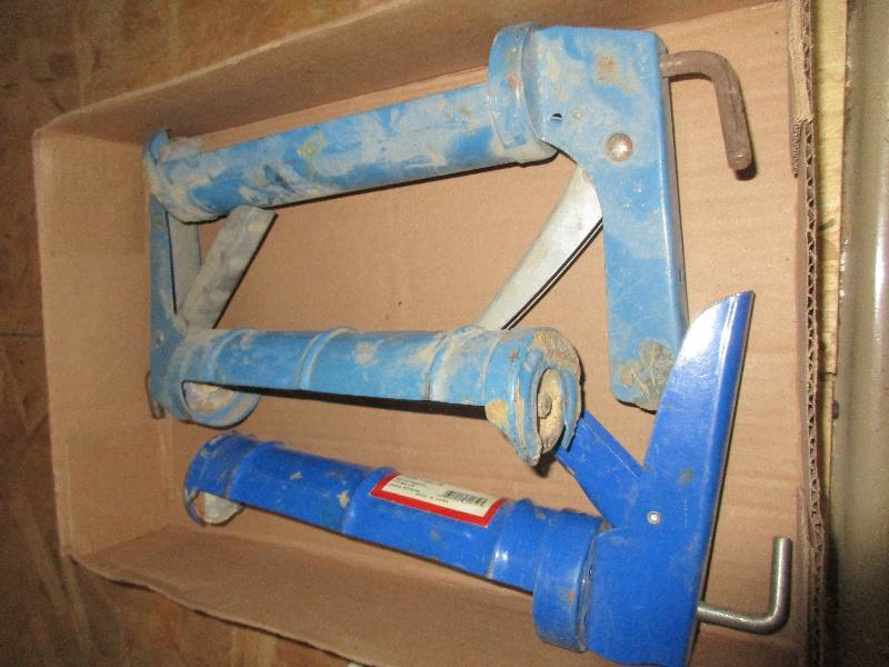 lot 33 image: 3 small caulk guns