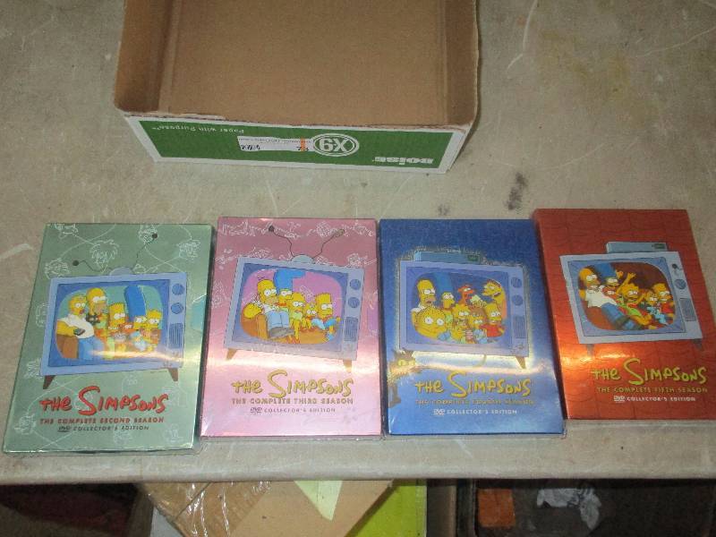 lot 73 image: Simpsons seasons 2, 3, 4, and 5 NEW unopened