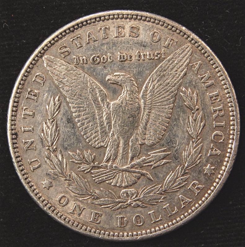1884 MORGAN SILVER DOLLAR AU CLEANED
