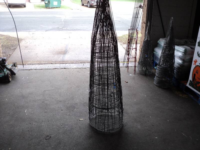 24 large tomato cages...