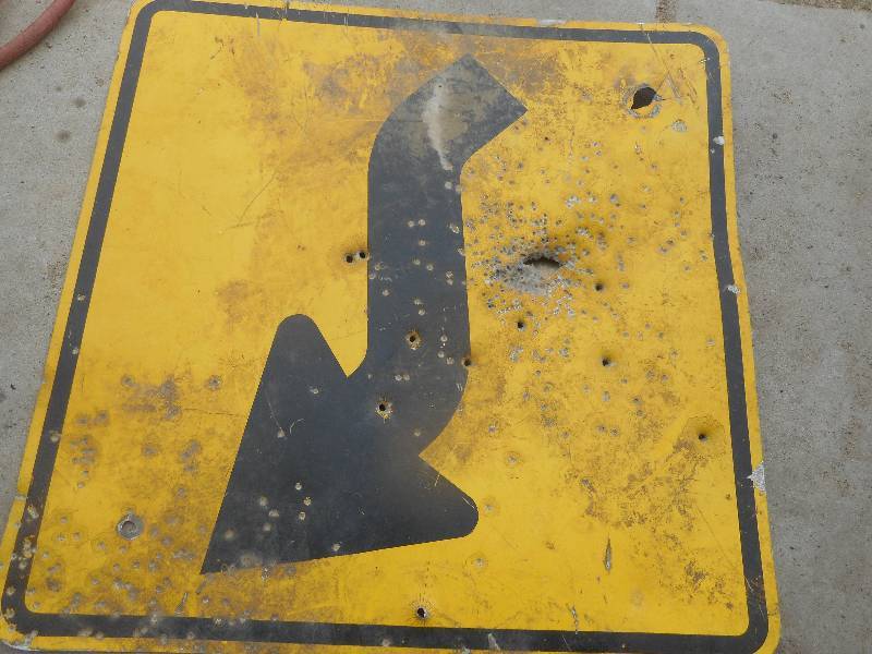 S CURVE SIGN