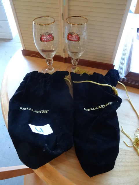 lot 61 image: Stella Artois beer glasses with 2 v...