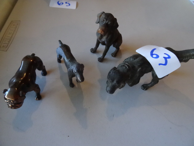 lot 63 image: 4 vintage dogs. 3 pointers and 1 bu...