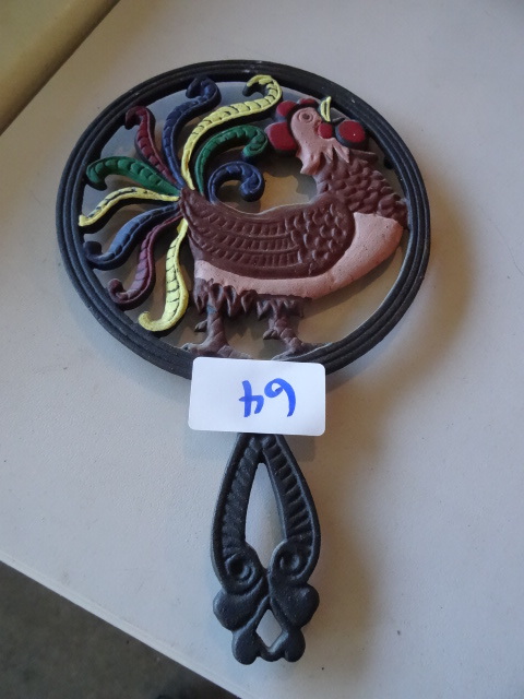 lot 64 image: Cast iron rooster trivet...