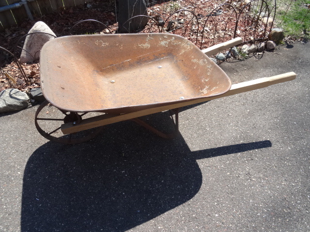 lot 87 image: Vintage wheel barrow with steel whe...