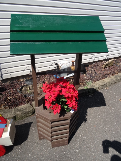 lot 88 image: Outdoor wishing well decoration. Fl...