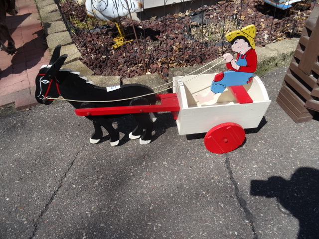 lot 89 image: Donkey pulling cart lawn ornament...