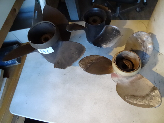 lot 197 image: 3 outboard motor props...