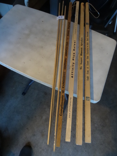 lot 202 image: Wood measuring sticks...