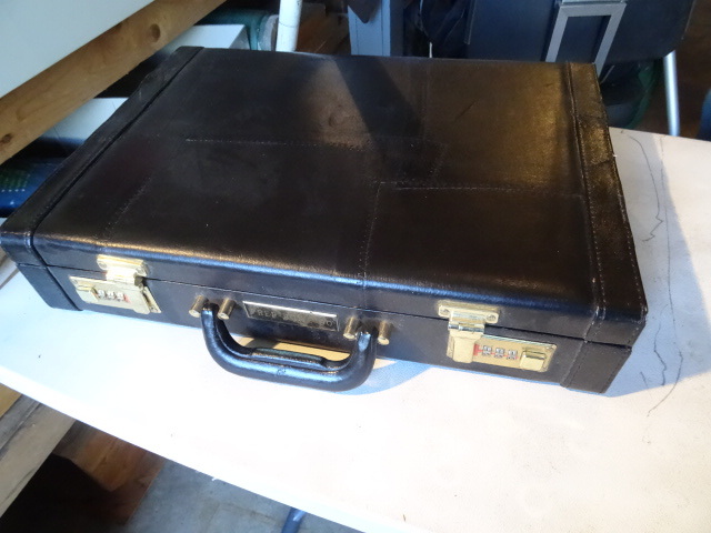 lot 214 image: Like new brief case with combo lock...