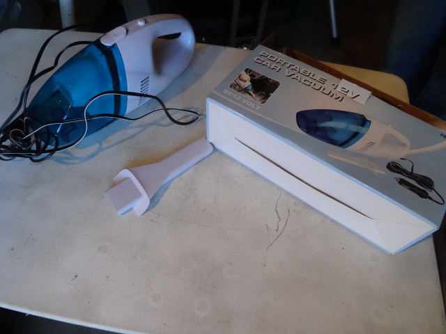 lot 228 image: Portable 12 volt vacuum...