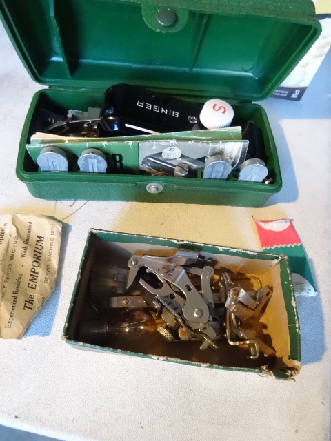 lot 252 image: Singer sewing machine accessories...