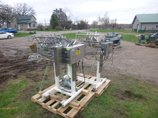 lot 45 image: 2 MGS 2 Pocket Feeders on Casters