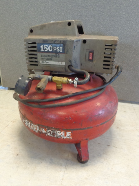 lot 27 image: Porter Cable Pancake Air Compressor