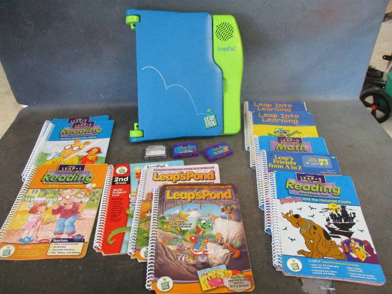 lot 142 image: Leap Pad and Leap books