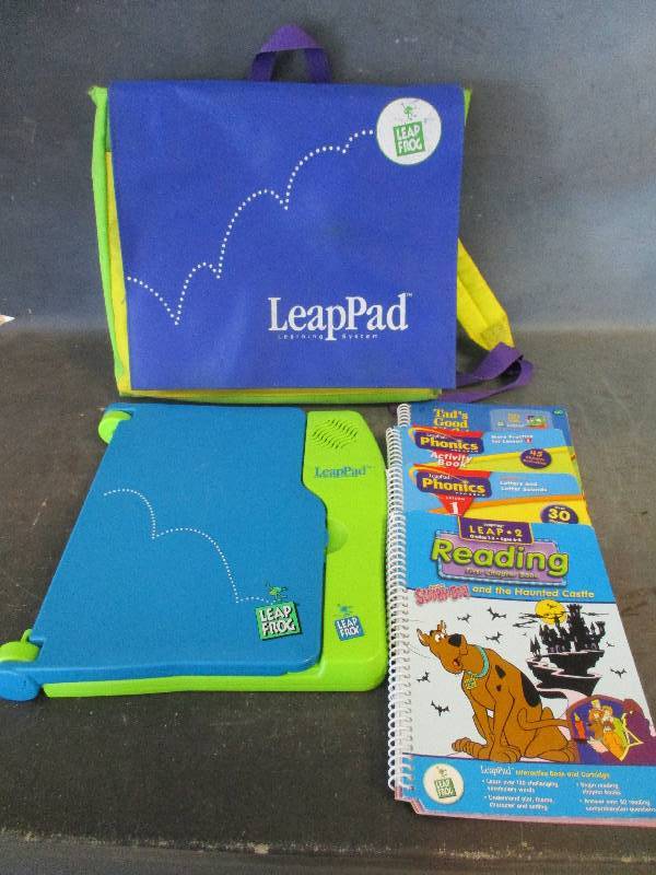 lot 143 image: Leap Pad Learning System and Backpack