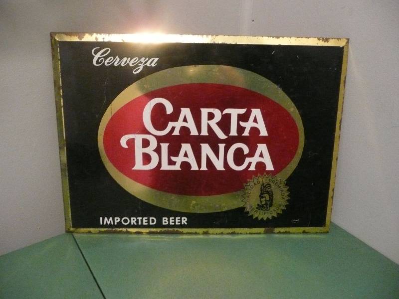 lot 50 image: Vintage Carta Blanca Imported Beer Easel Back Metal Front Sign