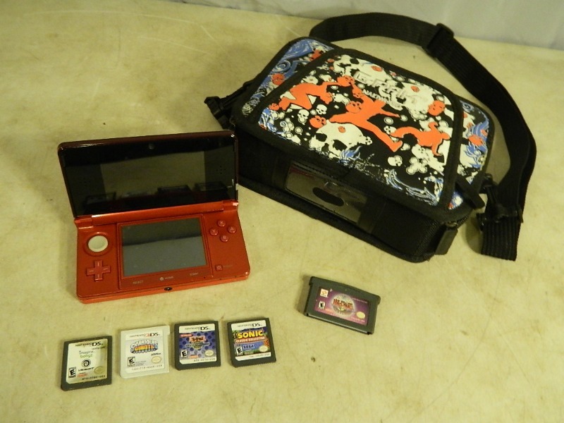 lot 27 image: Nintendo 3DS with Games and More