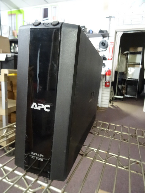 lot 62 image: Apc battery back ups XS1000...