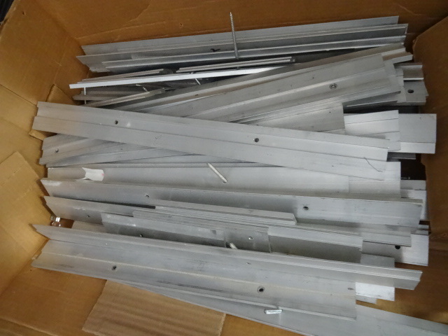 lot 66 image: Box full of aluminum Z hangers. Use...