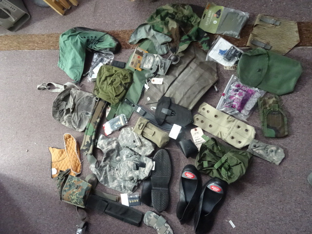 lot 67 image: Large variety of military surplus. ...