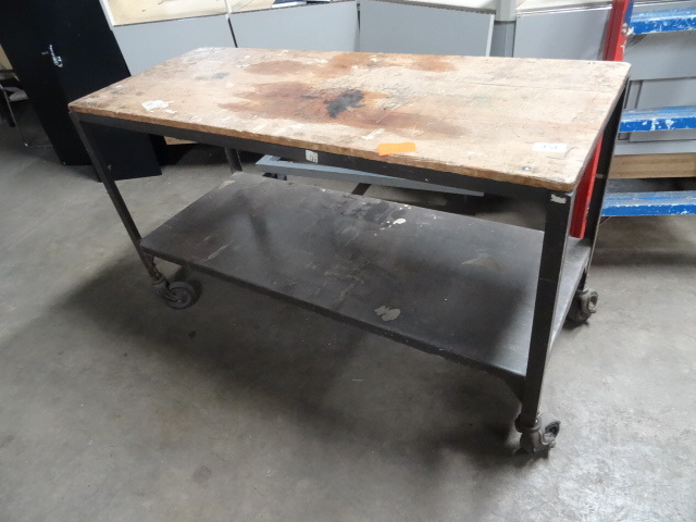 lot 156 image: 2 tier table on wheels. Metal frame...