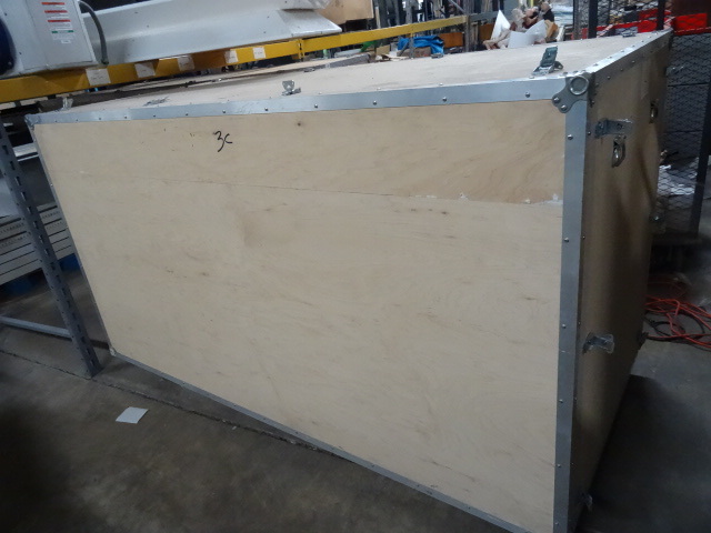 lot 154 image: Wood shipping case on wheels. Both ...
