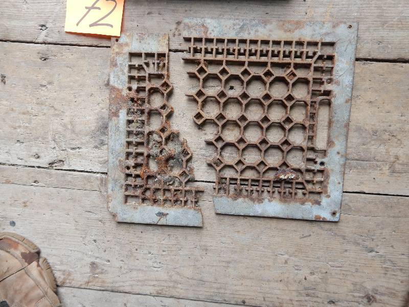 lot 72 image: Cast Iron Stove door and Steel Furnace Grate (broken as shown)