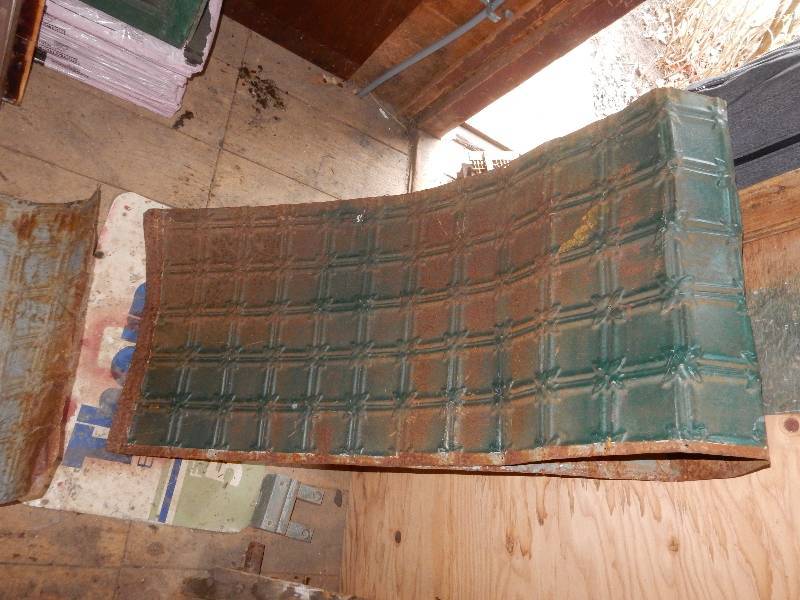 lot 74 image: 2 pieces of ceiling tin with raised pattern