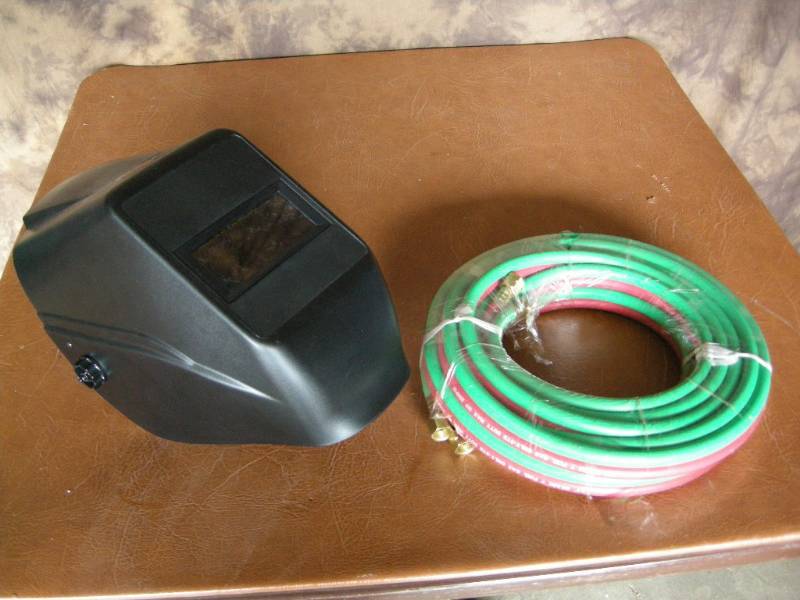 lot 112 image: Welding Hose and Helmet