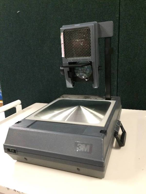 lot 47 image: 3M 2000 AG Portable Overhead Projector Foldable Briefcase. Retails used for $100