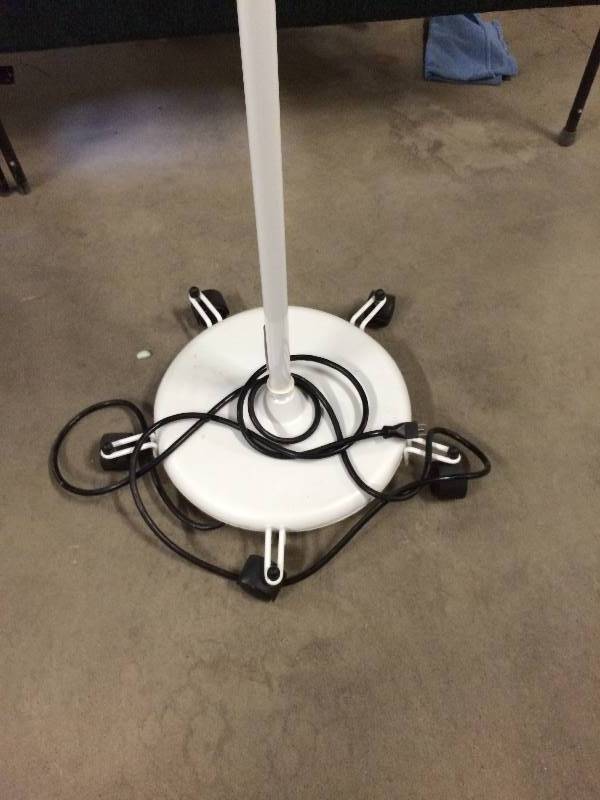 lot 54 image: Retails Used $300 McKesson Mobile Halogen Exam Lamp With Rolling Stand 81-016110 HALOGEN 35 Medical Clinic Exam Light Great For The Garage or Mechanics Light Crafters Photographers Too
