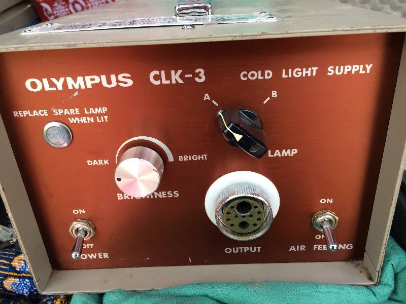 lot 107 image: OLYMPUS OSF-2 FLEXIBLE FIBEROPTIC SIGMOIDOSCOPE and Olympus CLK-3 Excellent condition and case.  Comes with Keys, Power Supply